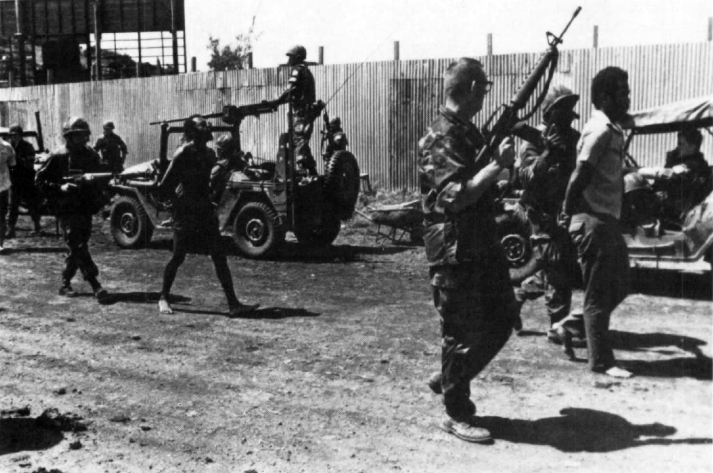 US Marines with prisoners Grenada 1983 Image Sgt. Christopher Grey